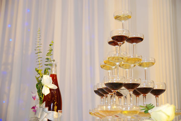 Champagne glasses tower in celebration party