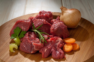 stew with ingredients over cutting board