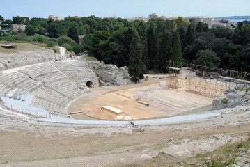 Tourists visiting the greek amphitheater, Syracuse, Sicily
