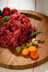 meat loaf with tomatoes and ingredients for italian ragu sauce