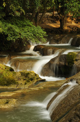 Waterfall in a park, Thailand VERTICAL