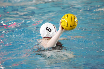 Female water polo player during a game.
