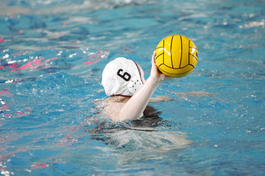 Female Water Polo Player During A Game.