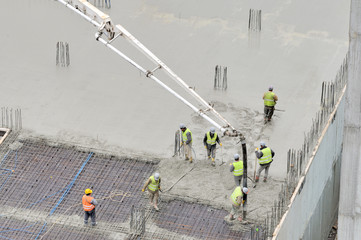Workers on a CONSTRUCTION site.