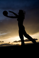 silhouette woman beach volleyball