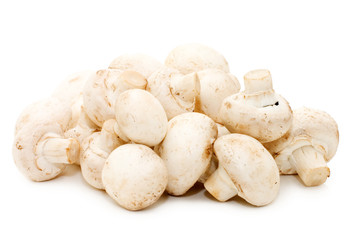 Heap of of mushroom champignon isolated on white background.