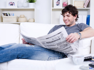 Man reading newspaper