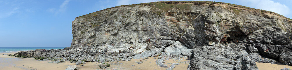Panoramic view of cliffs and fallen rocks in Porthtowan.