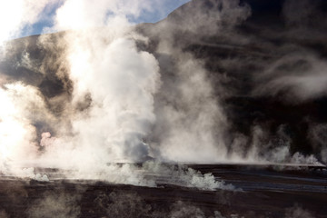 Fototapeta na wymiar Vapor rising from geyser field, Chile