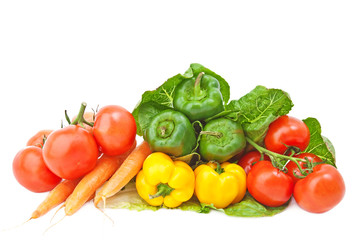 Various fresh vegetables on white background.