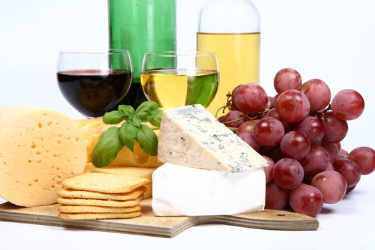 Types of cheese wine,grapes and crackers  in close up
