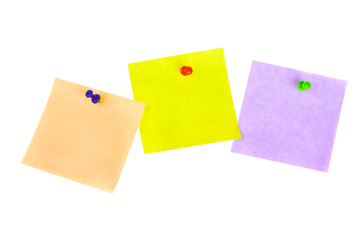 Three sticker notes with pins