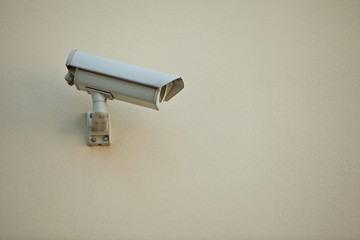 Security camera on wall of modern building