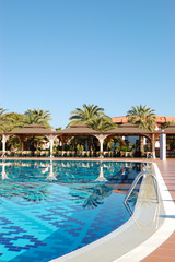 Swimming pool near open-air restaurant, Antalya, Turkey