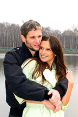 young loving couple in park