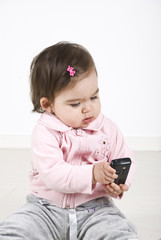 Baby with phone mobile