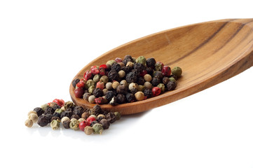 mix of pepper corns over the spoon