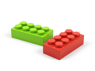 Plastic toy blocks on white background.