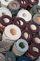 Pile of rolled up carpets