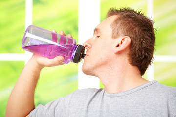 Man holding a water bottle