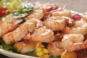 Shrimp lunch on a skewer, with mushrooms, pasta