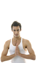 young male doing yoga exercises.