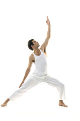 young male is making yoga