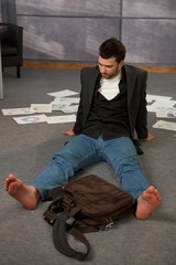 Trendy office worker on floor