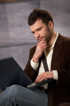 Guy working on laptop