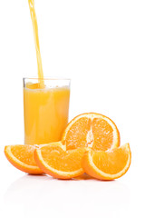 orange slices and juice at white