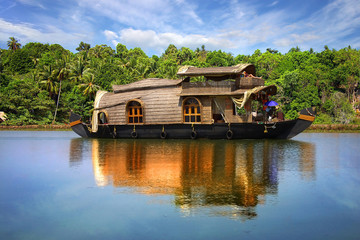 Houseboat in backwaters in India - 22381228