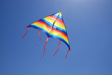 Kite against blue sky