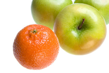 Fototapeta na wymiar Green Apple and tangerines on white background