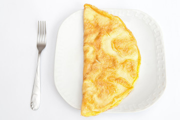 Omelet on white plate