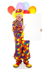 Happy Clown Points to Sign