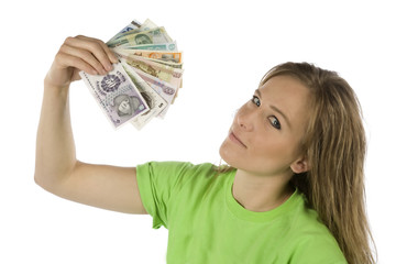 Woman fanning with different currencies