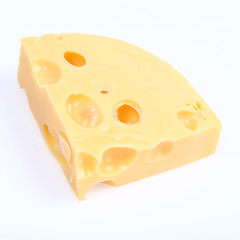 A piece of cheese on white background