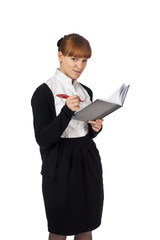 Female writing in organiser isolated on white background