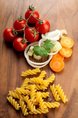 fusilli pasta with vegetables ingredients ready to cook