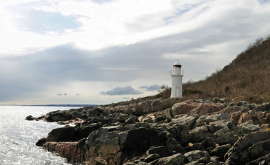 Fototapeta na wymiar Sea landscape with lighthouse