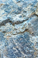 Rough rock surface texture closeup view.