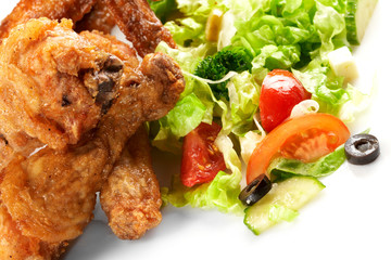 Chicken legs with fresh vegetables