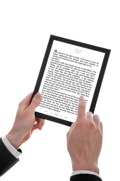 male hand holding a touchpad pc showing an E-Book
