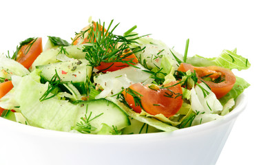 Fresh vegetable salad with tomato, lettuce, cucumber