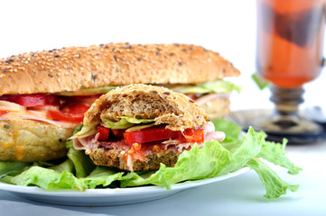Bite fresh sandwich with ham and cheese