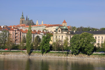 The View on spring Prague's gothic Castle above River Vltava