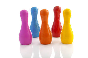 colorful bowling pins over white background