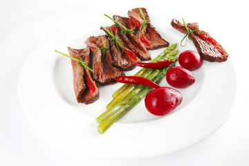 meat and vegetables on white plate