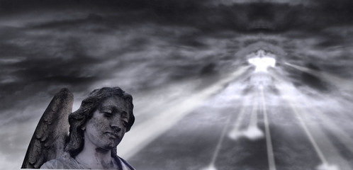 Angel and dramatic Sky