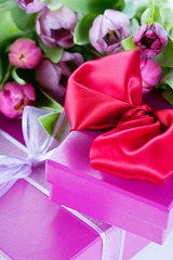 Pink tulips and gift boxes